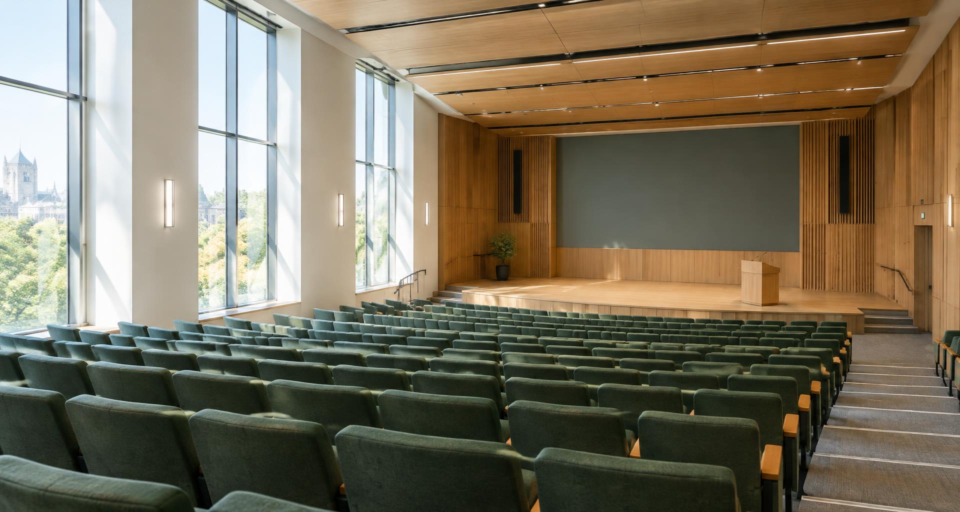 A sunlit university lecture auditorium